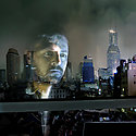Man looking through window
