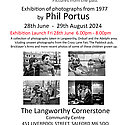 A poster with text about the exhibition including black and white documentary images of people