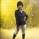 A woman dressed in horse riding outfit with a whip, looking directly at the camera, against a yellow background with white stars